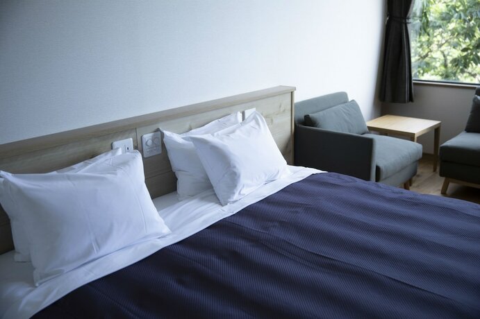 Imagen de la habitación del Hotel Miyajima Hanarenoyado IBUKU. Foto 24