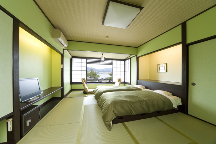 Imagen de la habitación del Hotel Miyajima Villa. Foto 13