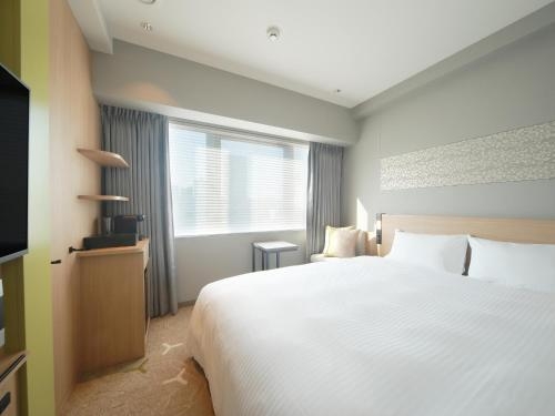 Imagen de la habitación del Hotel Miyako City Tokyo Takanawa. Foto 6