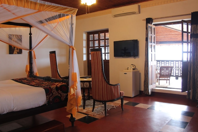 Imagen de la habitación del Hotel Mizingani Seafront. Foto 10