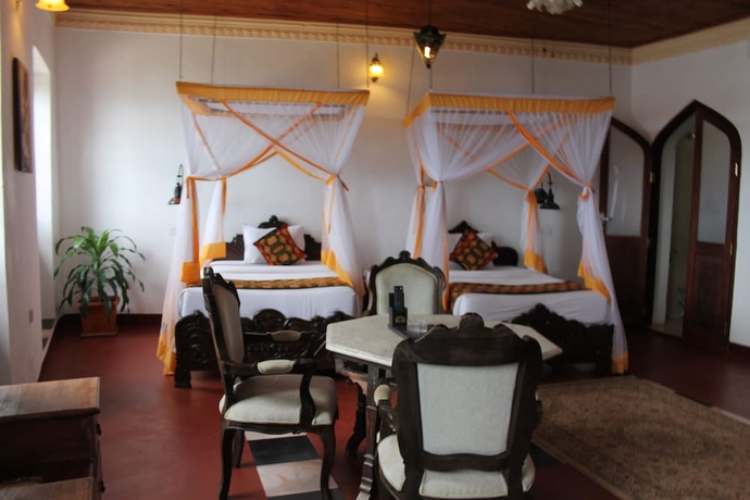 Imagen de la habitación del Hotel Mizingani Seafront. Foto 12