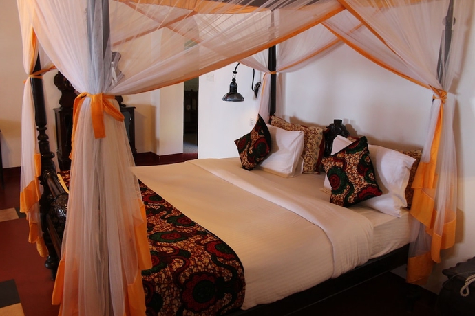 Imagen de la habitación del Hotel Mizingani Seafront. Foto 13