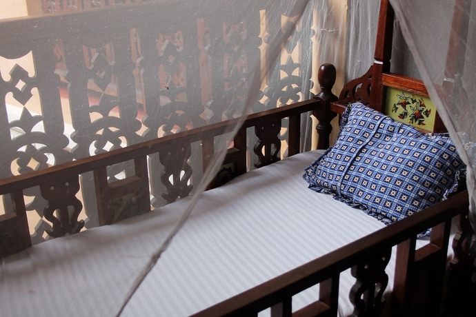 Imagen de la habitación del Hotel Mizingani Seafront. Foto 18