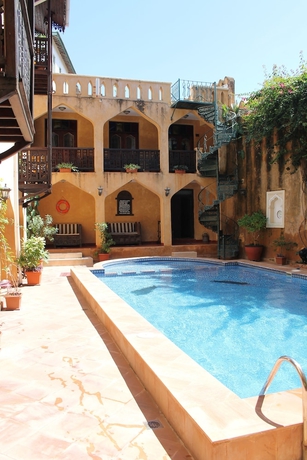 Imagen de la habitación del Hotel Mizingani Seafront. Foto 19