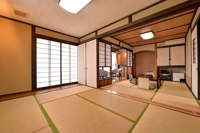 Imagen de la habitación del Hotel Mizuwake Minshuku Mura. Foto 23