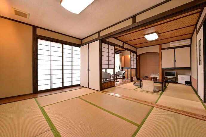 Imagen de la habitación del Hotel Mizuwake Minshuku Mura. Foto 24