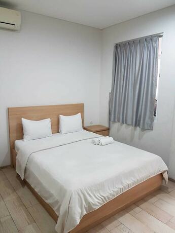 Imagen de la habitación del Hotel Mk House Scbd. Foto 18