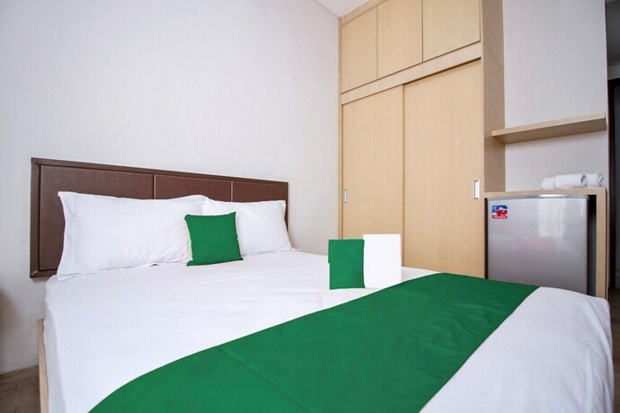 Imagen de la habitación del Hotel Mk House Scbd. Foto 25