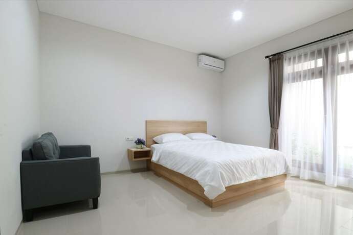 Imagen de la habitación del Hotel Mk House Tendean. Foto 24