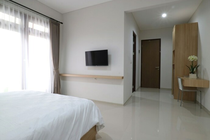 Imagen de la habitación del Hotel Mk House Tendean. Foto 27