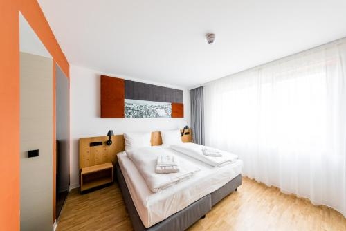 Imagen de la habitación del Hotel Mk Rüsselsheim. Foto 8