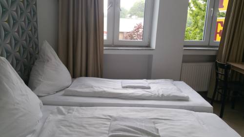 Imagen de la habitación del Hotel M-kinghotel. Foto 10