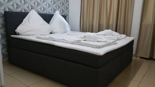 Imagen de la habitación del Hotel M-kinghotel. Foto 11