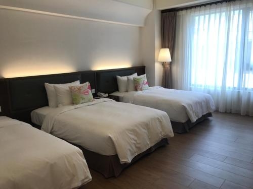 Imagen de la habitación del Hotel Ml, Chiayi City. Foto 8