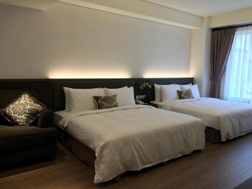 Imagen de la habitación del Hotel Ml, Chiayi City. Foto 9