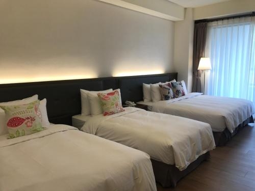 Imagen de la habitación del Hotel Ml, Chiayi City. Foto 10