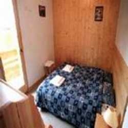 Imagen de los interiores del Hotel Mme Vacances By Eurogroup Les Chalets De La Tania. Foto 3