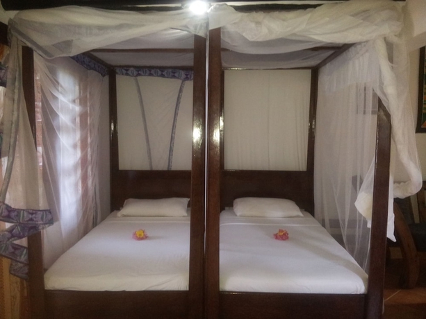 Imagen de la habitación del Hotel Mnarani Beach Cottages. Foto 3