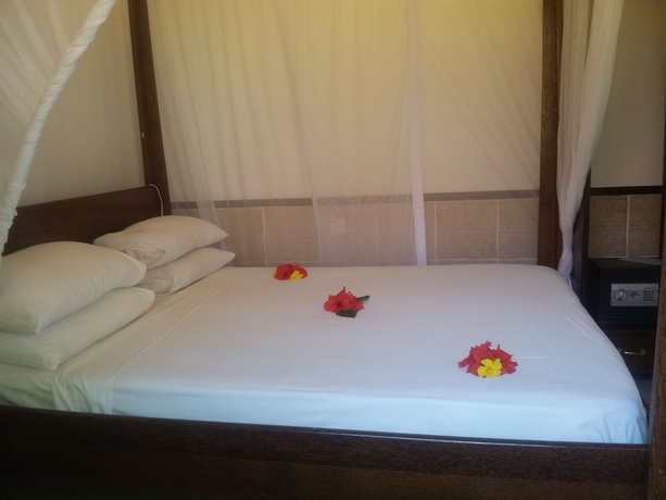 Imagen de la habitación del Hotel Mnarani Beach Cottages. Foto 4