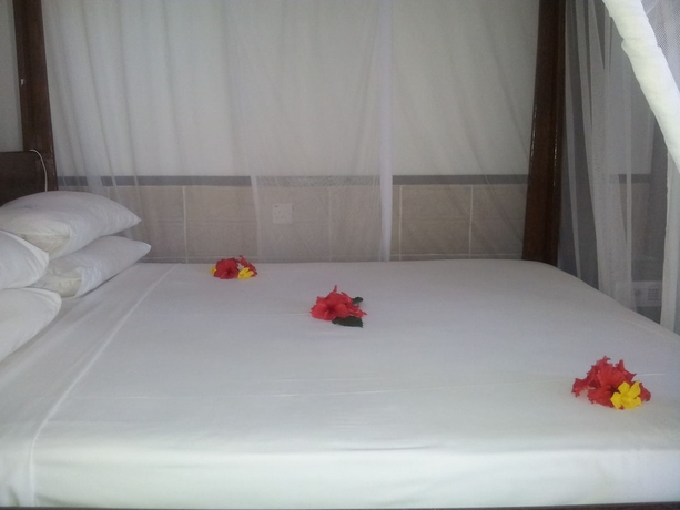 Imagen de la habitación del Hotel Mnarani Beach Cottages. Foto 8