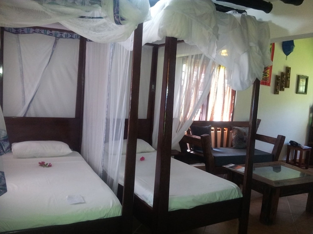 Imagen de la habitación del Hotel Mnarani Beach Cottages. Foto 13