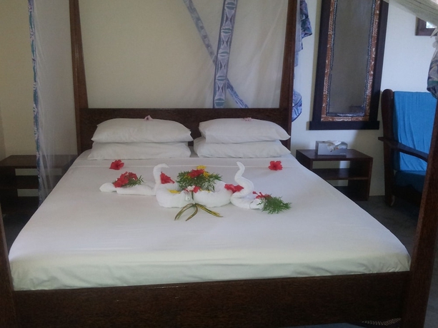 Imagen de la habitación del Hotel Mnarani Beach Cottages. Foto 15