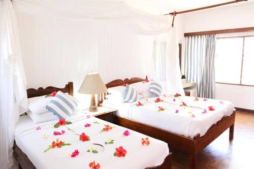 Imagen de la habitación del Hotel Mnarani Club & Spa. Foto 9