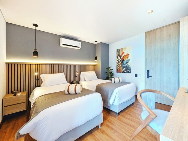 Imagen de la habitación del Hotel Moa Select. Foto 9