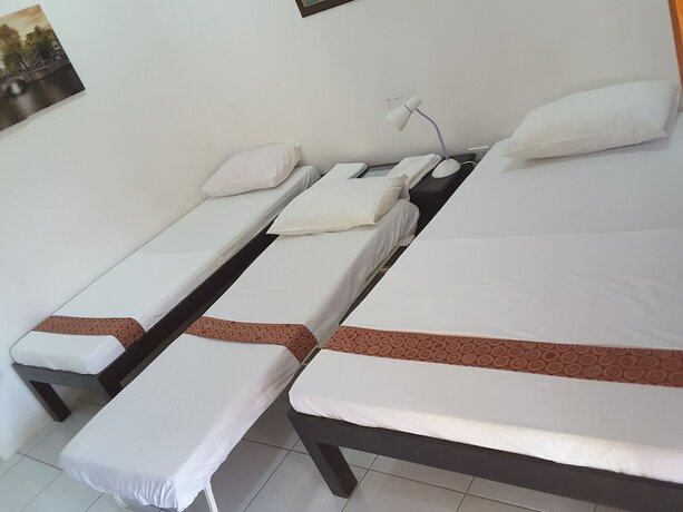 Imagen de la habitación del Hotel Moalboal Tropics. Foto 18