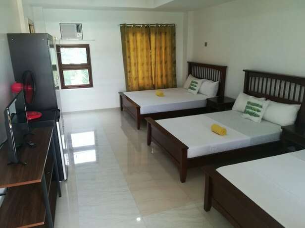 Imagen de la habitación del Hotel Moalboal Tropics. Foto 30
