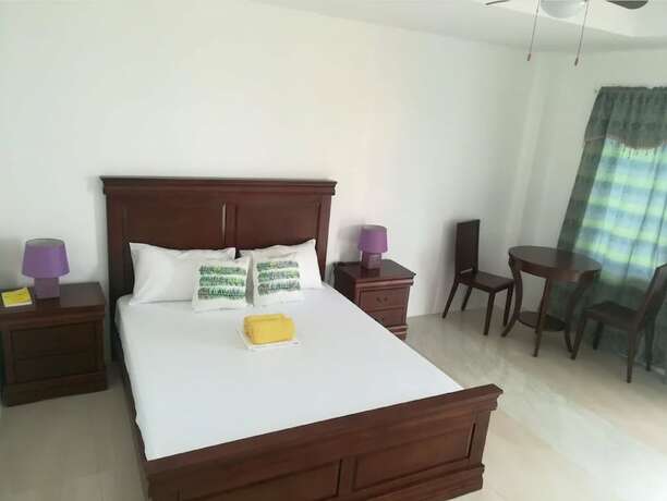 Imagen de la habitación del Hotel Moalboal Tropics. Foto 31
