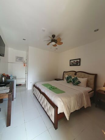 Imagen de la habitación del Hotel Moalboal Tropics. Foto 32