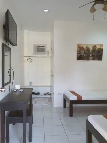 Imagen de la habitación del Hotel Moalboal Tropics. Foto 34