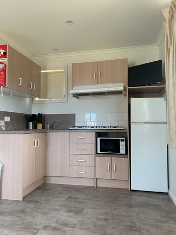 Imagen de la habitación del Hotel Moana Beach Tourist Park. Foto 34
