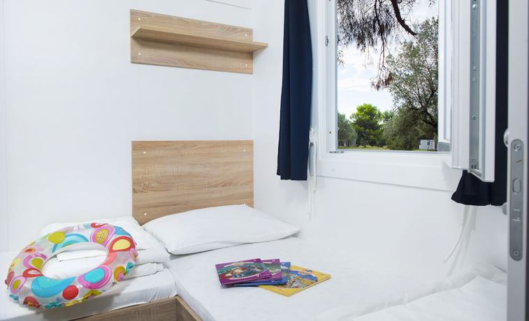 Imagen de la habitación del Hotel Mobile Homes Brijuni Pineta. Foto 11