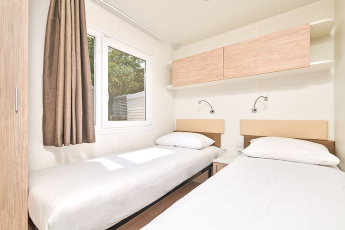 Imagen de la habitación del Hotel Mobile Homes Stella Maris. Foto 6