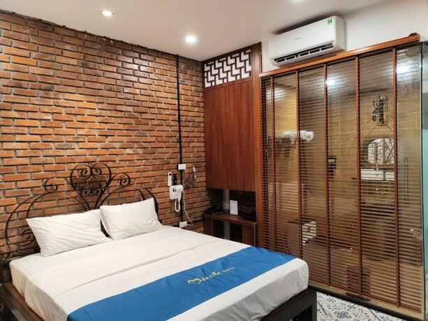 Imagen de la habitación del Hotel Moc An by Bay. Foto 10