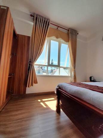 Imagen de la habitación del Hotel Moc Nhien Da Lat. Foto 12
