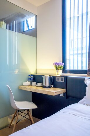 Imagen de la habitación del Hotel Mode Inn Icon City. Foto 15