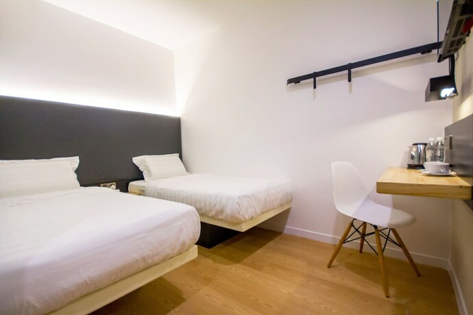 Imagen de la habitación del Hotel Mode Inn Icon City. Foto 18