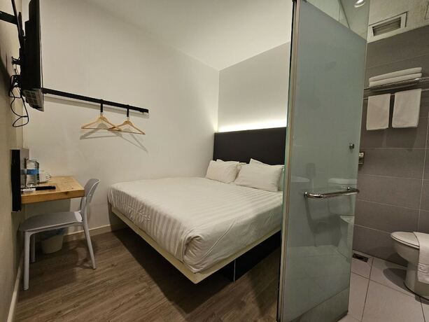 Imagen de la habitación del Hotel Mode Inn Icon City. Foto 19