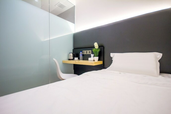 Imagen de la habitación del Hotel Mode Inn Icon City. Foto 21