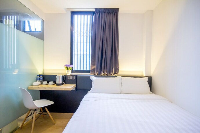 Imagen de la habitación del Hotel Mode Inn Icon City. Foto 30