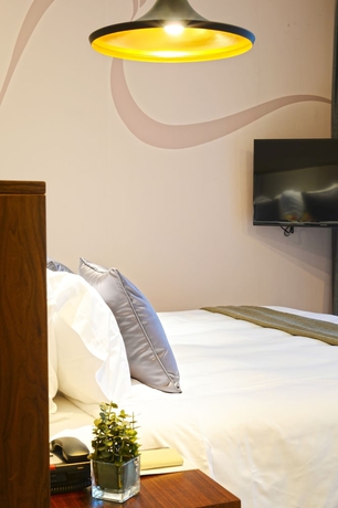Imagen de la habitación del Hotel Modena By Fraser New District Wuxi. Foto 4