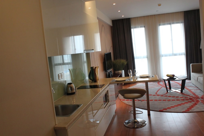 Imagen de la habitación del Hotel Modena By Fraser New District Wuxi. Foto 7