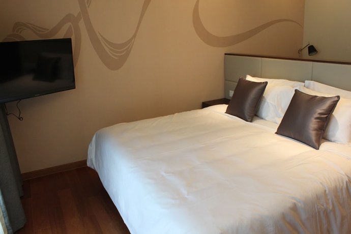 Imagen de la habitación del Hotel Modena By Fraser New District Wuxi. Foto 9