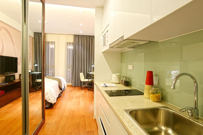 Imagen de la habitación del Hotel Modena By Fraser New District Wuxi. Foto 11