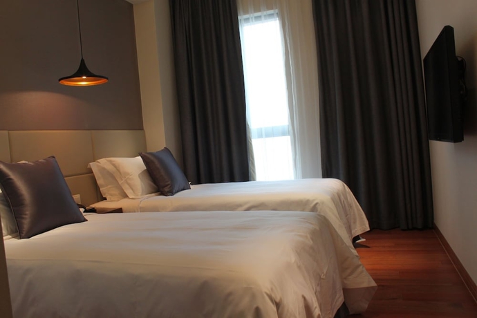Imagen de la habitación del Hotel Modena By Fraser New District Wuxi. Foto 17