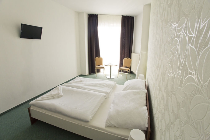 Imagen de la habitación del Hotel Modena. Foto 3