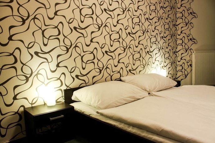 Imagen de la habitación del Hotel Modena. Foto 8